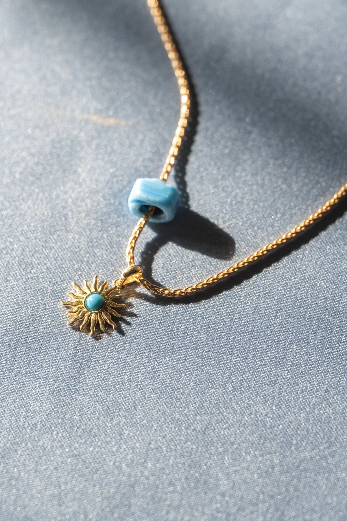 Turquoise Helios Charm