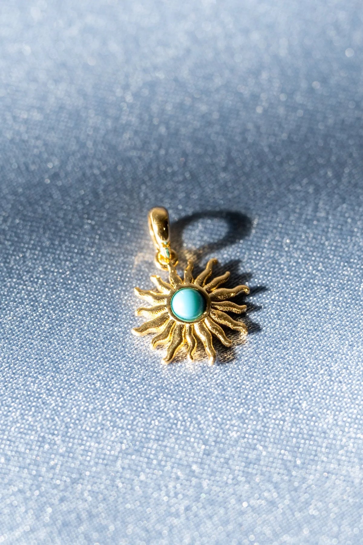 Turquoise Helios Charm